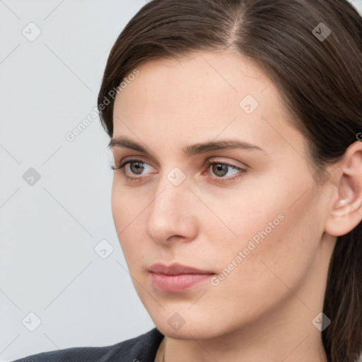 Neutral white young-adult female with medium  brown hair and grey eyes