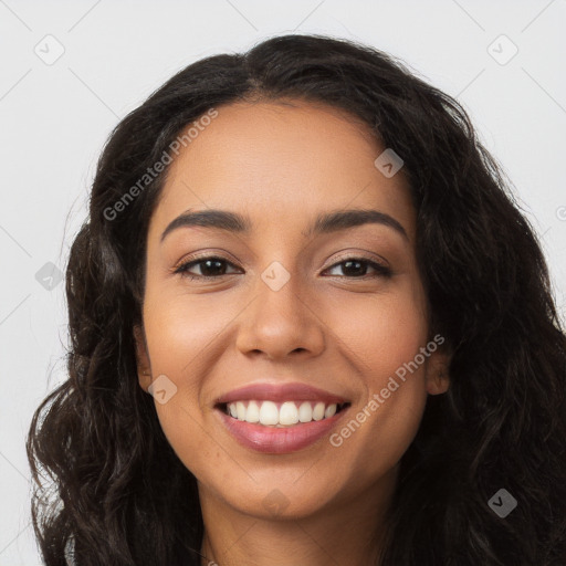 Joyful latino young-adult female with long  brown hair and brown eyes