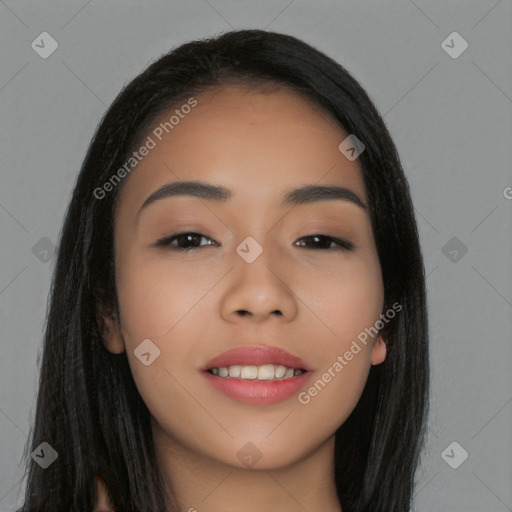 Joyful latino young-adult female with long  black hair and brown eyes