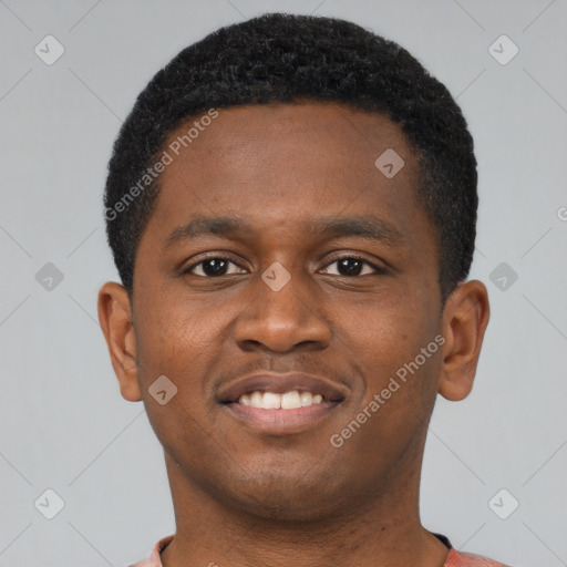 Joyful latino young-adult male with short  brown hair and brown eyes