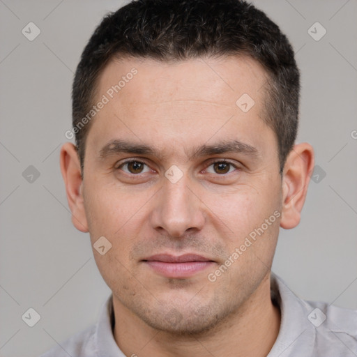 Joyful white young-adult male with short  brown hair and brown eyes