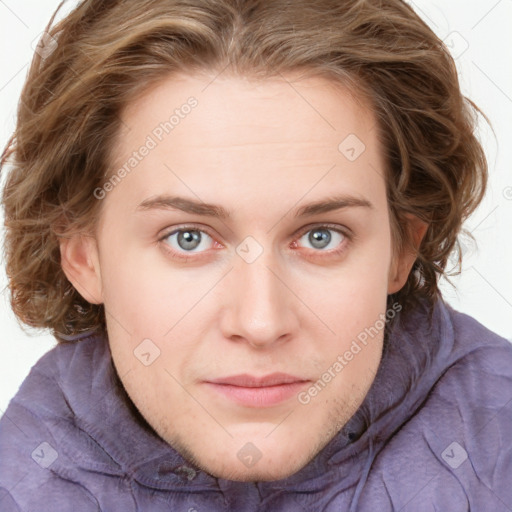 Joyful white young-adult female with long  brown hair and blue eyes