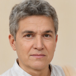 Joyful white middle-aged male with short  brown hair and brown eyes