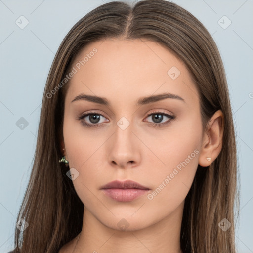 Neutral white young-adult female with long  brown hair and brown eyes