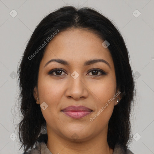 Joyful latino young-adult female with long  brown hair and brown eyes