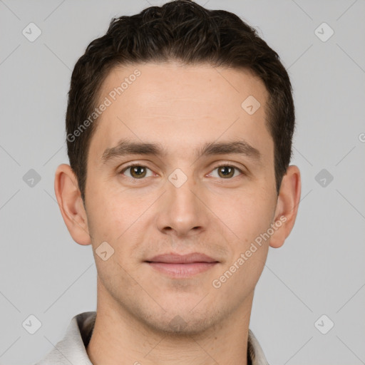 Joyful white young-adult male with short  brown hair and brown eyes