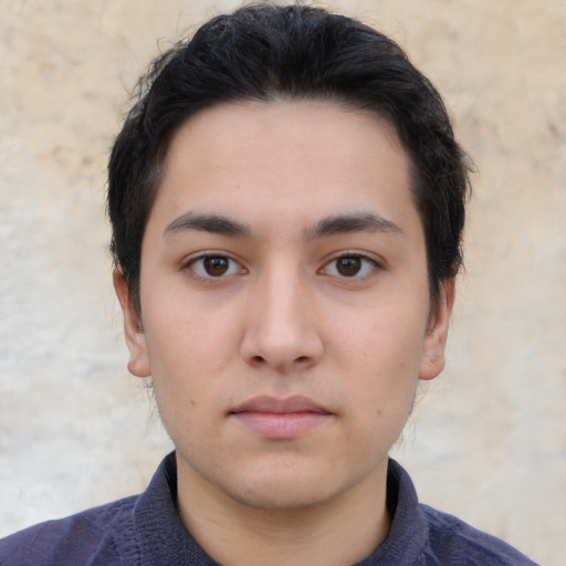 Neutral white young-adult male with short  black hair and brown eyes