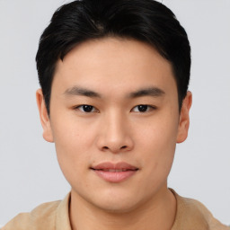 Neutral asian young-adult male with short  brown hair and brown eyes