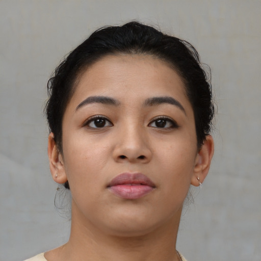 Neutral asian young-adult female with short  brown hair and brown eyes