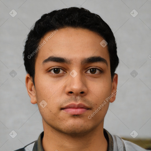 Neutral latino young-adult male with short  black hair and brown eyes