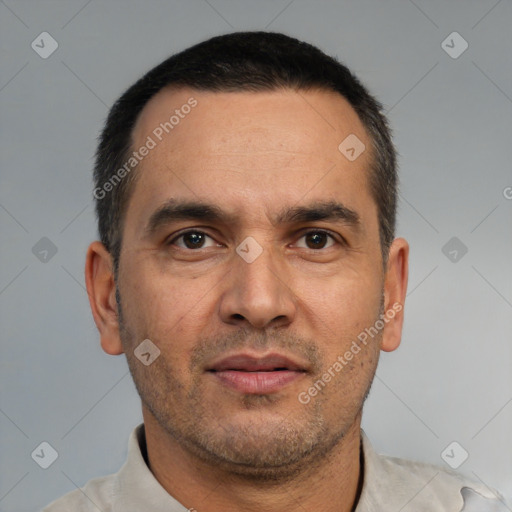 Neutral white adult male with short  black hair and brown eyes