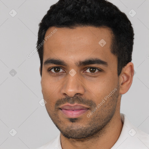 Neutral latino young-adult male with short  black hair and brown eyes