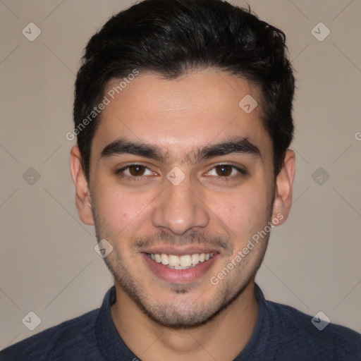 Joyful white young-adult male with short  black hair and brown eyes