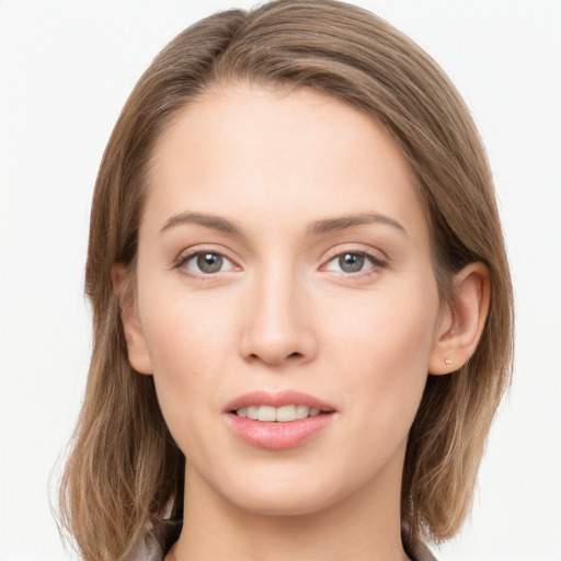 Joyful white young-adult female with long  brown hair and grey eyes