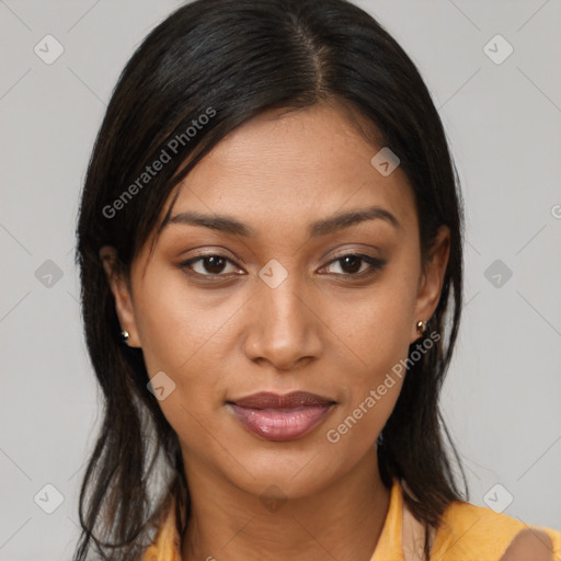 Joyful latino young-adult female with medium  brown hair and brown eyes