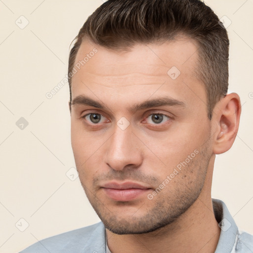 Neutral white young-adult male with short  brown hair and brown eyes