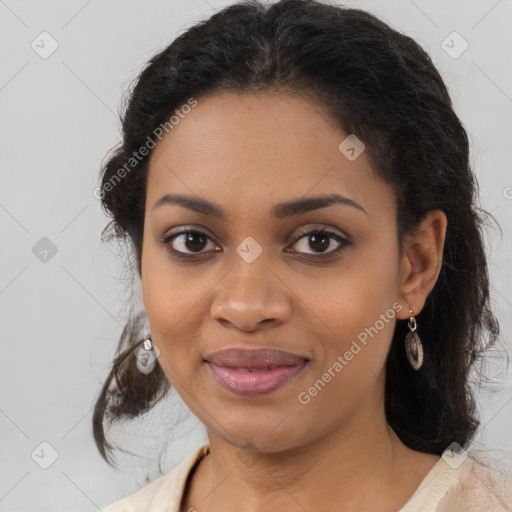 Joyful black young-adult female with medium  brown hair and brown eyes