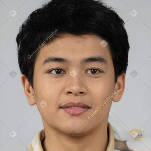 Joyful asian young-adult male with short  black hair and brown eyes