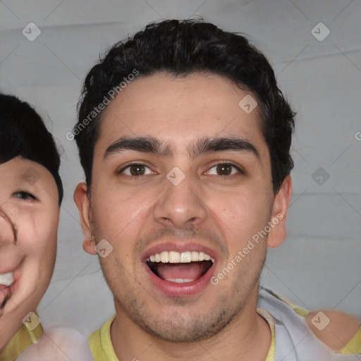 Joyful white young-adult male with short  black hair and brown eyes