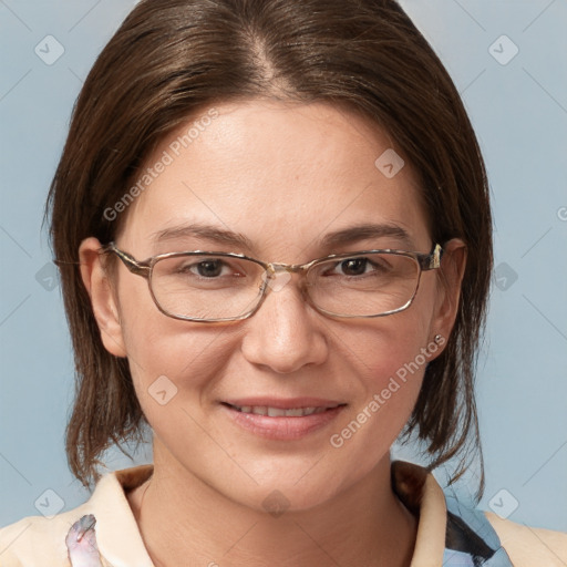 Joyful white adult female with medium  brown hair and grey eyes