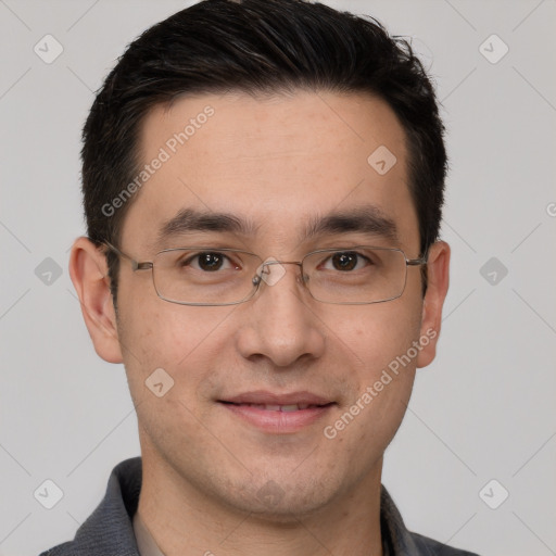 Joyful white adult male with short  brown hair and brown eyes