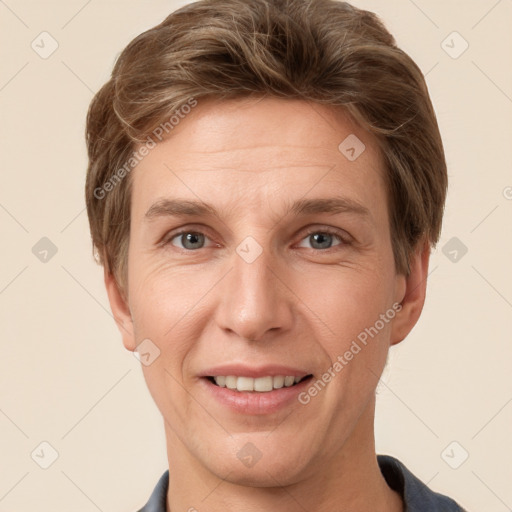 Joyful white adult female with short  brown hair and grey eyes