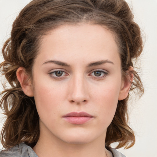 Neutral white young-adult female with medium  brown hair and grey eyes