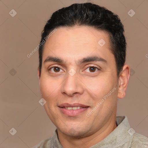 Joyful white adult male with short  brown hair and brown eyes