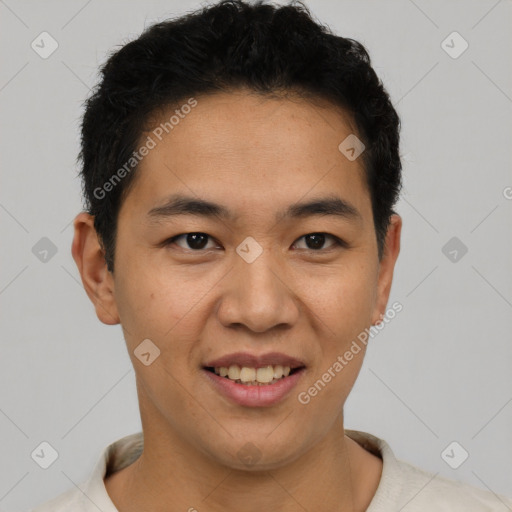 Joyful latino young-adult male with short  black hair and brown eyes