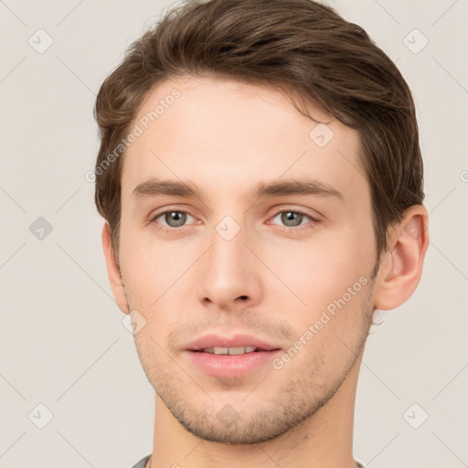 Neutral white young-adult male with short  brown hair and grey eyes