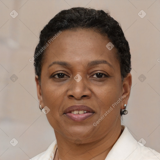 Joyful black adult female with short  brown hair and brown eyes