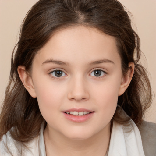 Joyful white child female with medium  brown hair and brown eyes