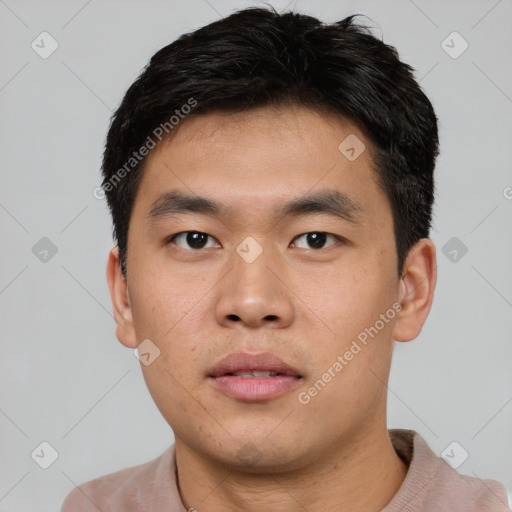 Neutral asian young-adult male with short  brown hair and brown eyes