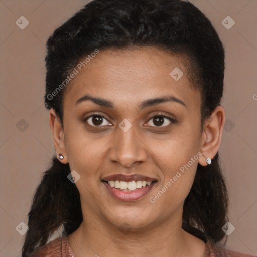 Joyful latino young-adult female with short  brown hair and brown eyes