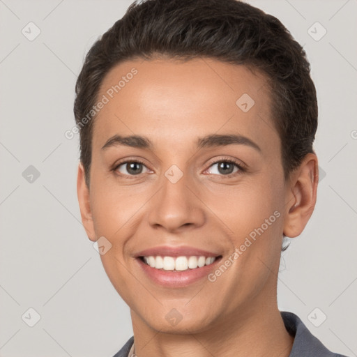 Joyful white young-adult female with short  brown hair and brown eyes