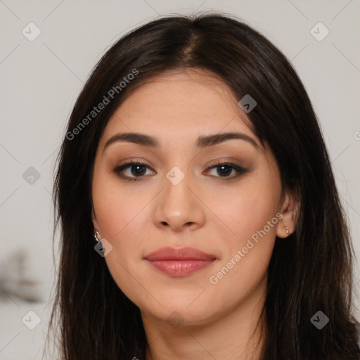 Joyful latino young-adult female with long  brown hair and brown eyes