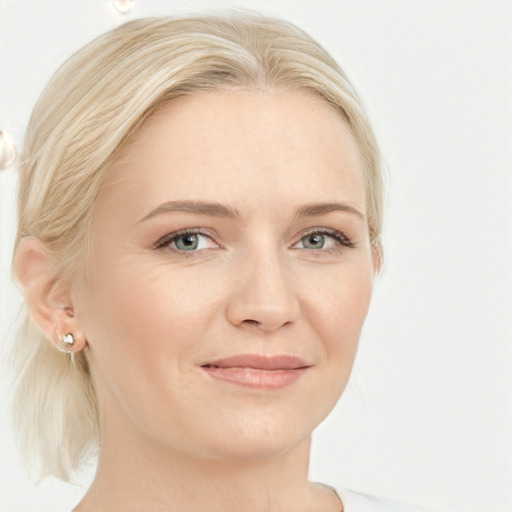 Joyful white young-adult female with medium  blond hair and blue eyes