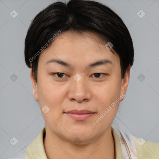 Joyful asian young-adult female with short  brown hair and brown eyes