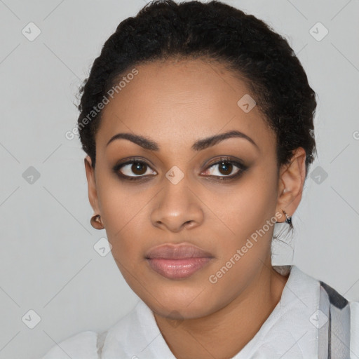 Joyful latino young-adult female with short  black hair and brown eyes