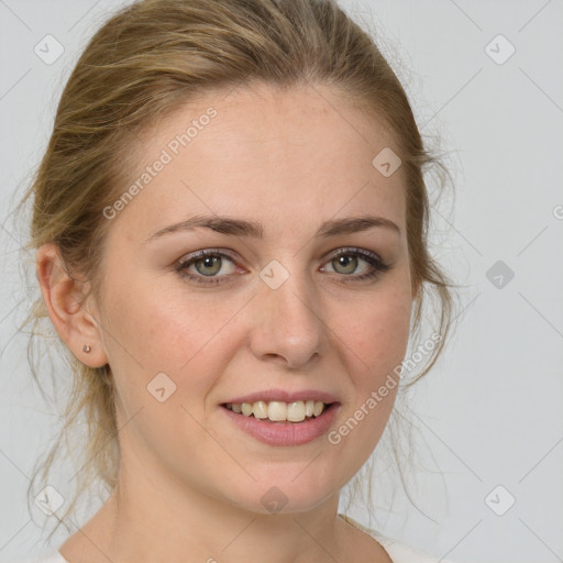 Joyful white young-adult female with medium  brown hair and green eyes