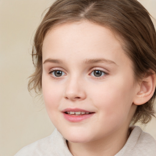 Joyful white child female with medium  brown hair and brown eyes