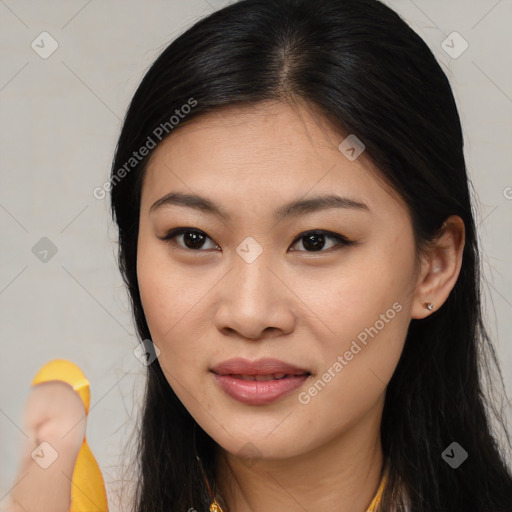 Joyful asian young-adult female with long  brown hair and brown eyes