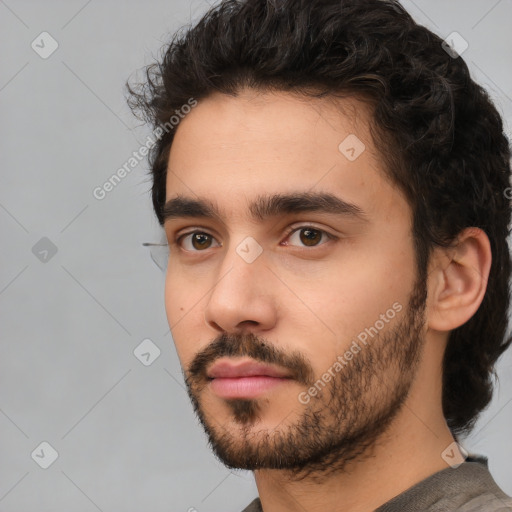 Neutral white young-adult male with short  black hair and brown eyes