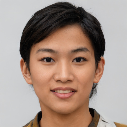 Joyful asian young-adult female with short  brown hair and brown eyes