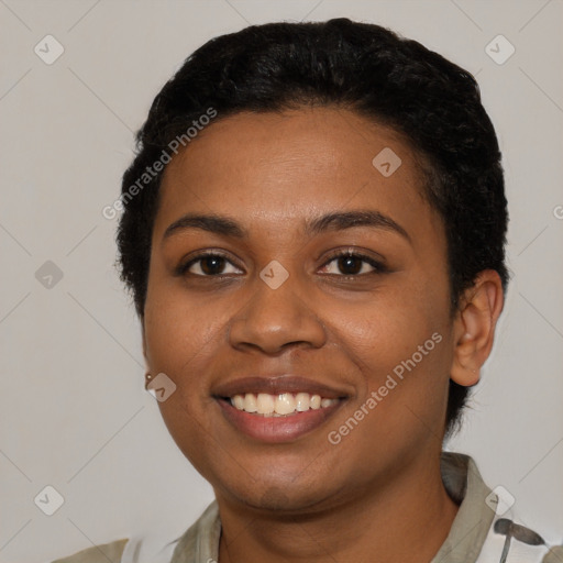 Joyful latino young-adult female with short  black hair and brown eyes