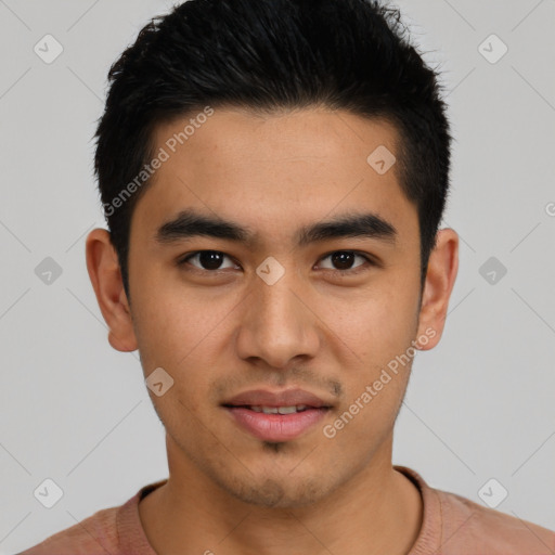 Joyful asian young-adult male with short  black hair and brown eyes