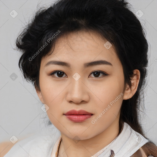 Joyful asian young-adult female with medium  black hair and brown eyes