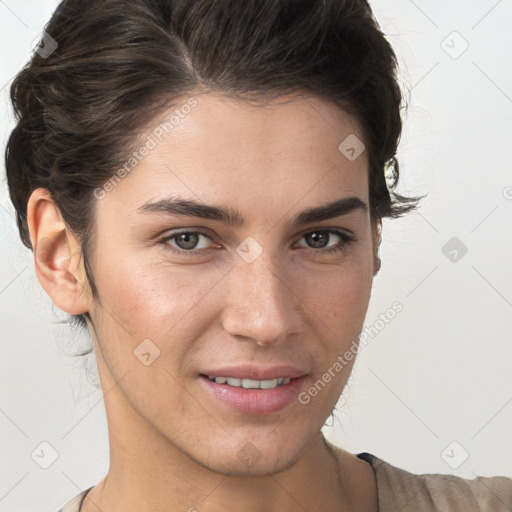 Joyful white young-adult female with short  brown hair and brown eyes