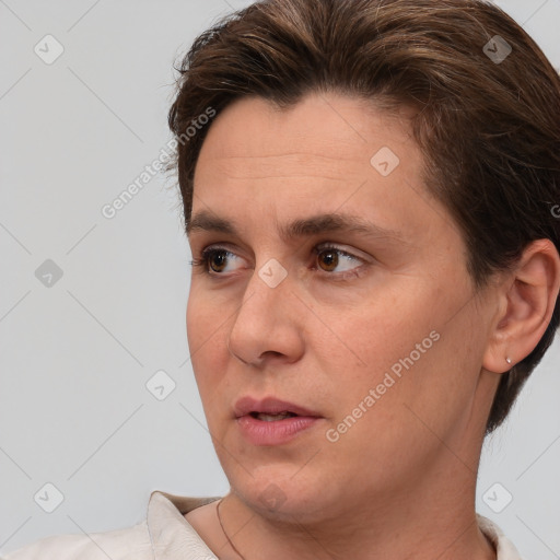 Neutral white adult male with short  brown hair and brown eyes