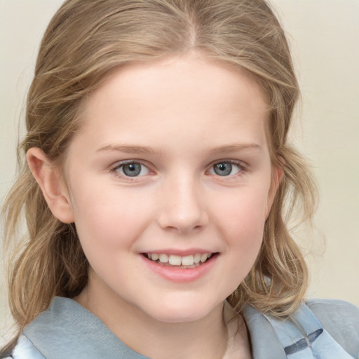 Joyful white child female with medium  brown hair and blue eyes